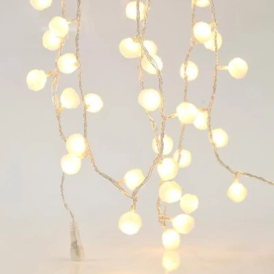100 Led σε σειρά με λευκές υφασμάτινες μπάλες θερμό λευκό φως διάφανο καλώδιο και μετασχηματιστή