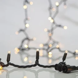 96 led λαμπάκια σε σειρά θερμό λευκό φως 1900-2000Κ με 2 επεκτάσεις έως 10 σετ & πράσινο καουτσούκ καλώδιο IP44