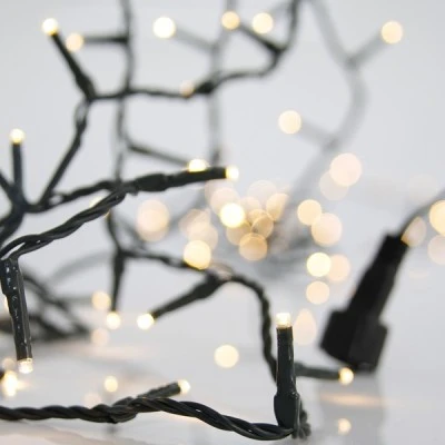 100 led λαμπάκια σε σειρά θερμό λευκό φως με 4 επεκτάσεις εώς 3 σετ, 31v μετασχηματιστή & πράσινο pvc καλώδιο IP44