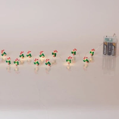 20 mini led ζαχαρωτό με πράσινο φιόγκο με θερμό λευκό φως, μπαταρία 3xΑΑ, χρονοδιακόπτη & ασημί χάλκινο καλώδιο IP20 20 mini led ζαχαρωτό με πράσινο φιόγκο με θερμό λευκό φως, μπαταρία 3xΑΑ, χρονοδιακόπτη & ασημί χάλκινο καλώδιο IP20