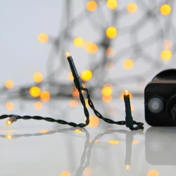 1500 led λαμπάκια σε σειρά θερμό λευκό φως με 8 προγράμματα & μνήμη, 31v μετασχηματιστή & πράσινο pvc καλώδιο IP44