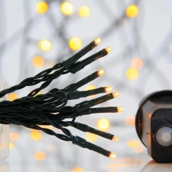 400 led λαμπάκια σε σειρά θερμό λευκό με 8 προγράμματα & μνήμη, μετασχηματιστή 31V πράσινο pvc καλώδιο IP44