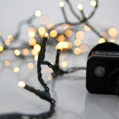 100 led λαμπάκια σε σειρά με θερμό φως 8 προγράμματα & μνήμη, πράσινο καλώδιο και 31v μετασχηματιστή IP44