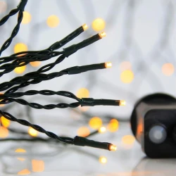 300 led λαμπάκια σε σειρά θερμό λευκό φως 8 προγράμματα & μνήμη, 31v μετασχηματιστή & πράσινο pvc καλώδιο IP44  